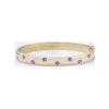 Heavy 14k yellow gold bangle bracelet with burnished real round pink sapphires for sale