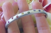 Natural Rainbow Sapphire Bangle with burnished round multicolor sapphires. LGBT