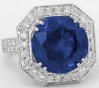 Round cut natural blue sapphire ring in 18k white gold