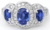 Halo set oval cut natural blue sapphire ring in 14k white gold