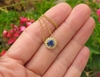 Round Natural Sapphire Solitaire Pendant with a Diamond Halo in 14k yellow gold