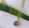 Round Natural Sapphire Solitaire Pendant with Ceylon Blue Sapphire set in 14k yellow gold for sale