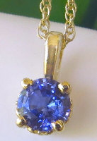 Natural Sapphire Solitaire Pendant with Round Ceylon Blue Sapphire set in 14k yellow gold for sale