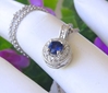 Royal Blue Natural Ceylon Sapphire Pendant with a Diamond Halo in solid 14k white gold for sale
