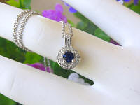 Natural Blue Sapphire Necklace with a Diamond Halo in solid 14k white gold for sale