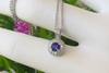 Round Cut Natural Purple Sapphire and Diamond Halo Pendant Necklace in 14k white gold for sale