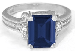 Emerald Cut Blue Sapphire Three Stone Ring in 14k white gold