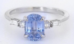 Oval Ceylon blue sapphire and diamond ring in 14k white gold