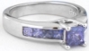 Natural Princess Cut Purple Sapphire Engagement Ring in 14k white gold with channel set princess cut sapphires