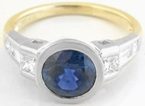 Natural Blue Sapphire Bezel Set Engagement ring with real princess and baguette diamonds in solid 18k white gold for sale