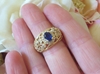 Natural Oval Sapphire Ring with Open Flower Design in solid 14k yellow gold for sale