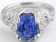 Solid platinum Natural Ceylon Oval Blue Sapphire Ring in a vintage style real diamond mounting