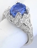 Real Platinum Natural Oval Sapphire Ring in a antique style mounting with real diamonds and millgrain