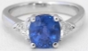 Trillion cut natural blue sapphire ring in 14k white gold