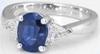 Oval Blue and Trillion White Sapphire Ring in 14k white gold