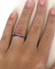 Natural Channel Set Sapphire Eternity Band Ring with Princess Cut Blue Sapphires set in a gold or platinum for sale