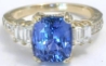 Cushion cut natural blue sapphire ring in 14k yellow gold