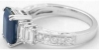 18k white gold ring with Fancy Baguette Diamonds, Round Diamonds and 9x7mm Emerald Cut Blue Sapphire