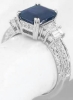 Profile View of Hand Engraved Natural Sapphire Engagement Ring with Baguette and Round Diamonds in 18k