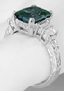Large Green Sapphire Ring with Baguette Diamonds in 18k white gold