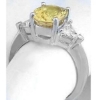Oval Sapphire and Trillion Diamond Ring