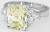 Large 4 1/2 carat Radiant Cut Natural Unheated Yellow Sapphire and Diamond Ring in 14k white gold