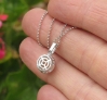 back of round natural yellow sapphire pendant