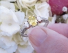 Oval Natural Yellow Sapphire Three Stone Wedding Ring with real oval side diamonds in a antique style setting in solid platinum for sale
