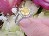 GIA tested round natural yellow sapphire ring with diamond halo in white gold for sale