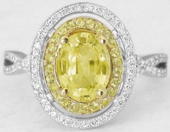 Halo set natural yellow sapphire ring in 14k white and yellow gold