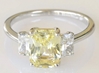 Radiant Cut Natural Yellow Sapphire Three Stone Ring with White Sapphire Side Stones set in 14k white gold