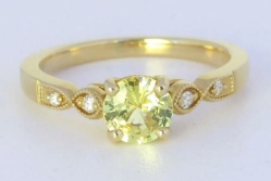 Natural yellow sapphire and diamond ring in 14k yellow gold