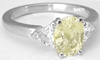 Unheated Oval Yellow and Trillion White Sapphire Ring