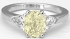 Unheated Oval Yellow Ring with Trillion White Sapphires