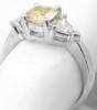 Natural Cushion Cut Yellow Sapphire Three Stone Ring with Trillion White Sapphires in 14k white gold