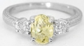 Natural Oval Yellow Sapphire Ring with Real Round Diamonds in 14k white gold for sale