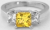 Princess cut natural yellow sapphire ring in 14k white gold