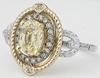 Untreated Oval Yellow Sapphire and Diamond Ring in 14k white and yellow gold