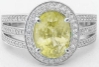 Natural Unheated Oval Yellow Sapphire Ring with Diamond Halo and Split Shank Ring in 14k white gold